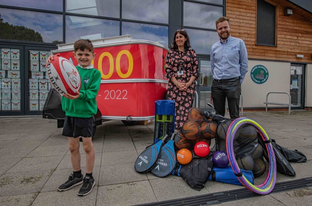 Sports-mad Ioan, six, is on the ball to win prize for his school