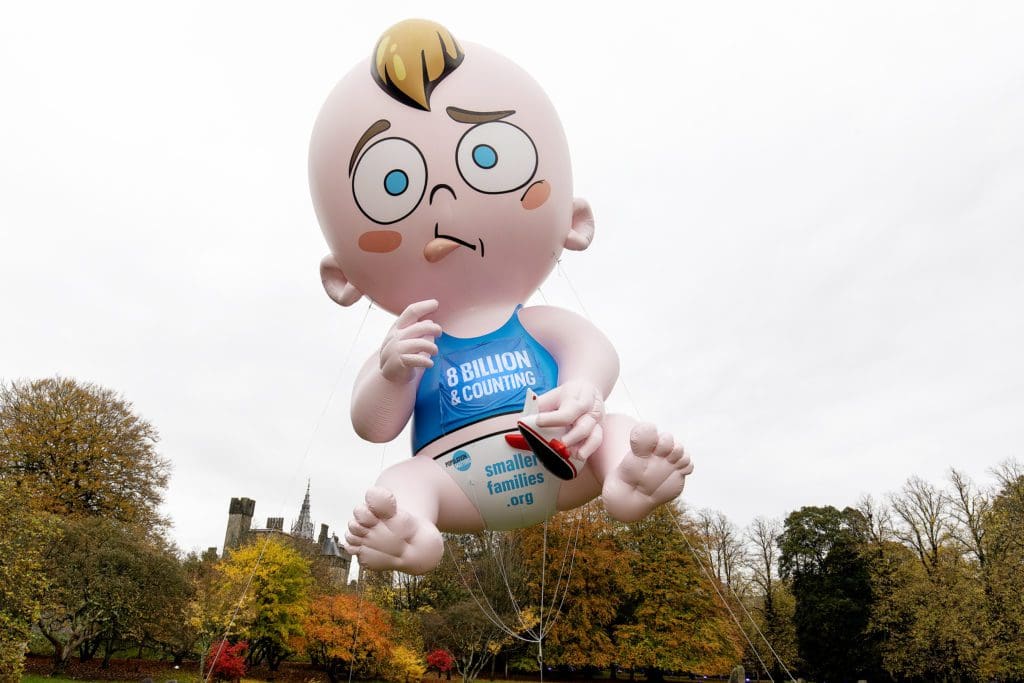 Population Matters flies giant inflatable baby in Cardiff