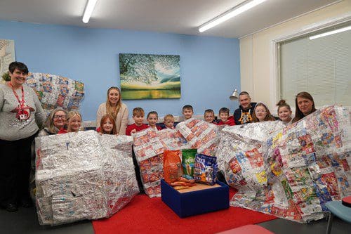 Caedraw schoolchildren help the homeless with ‘Crisp Packet Project’