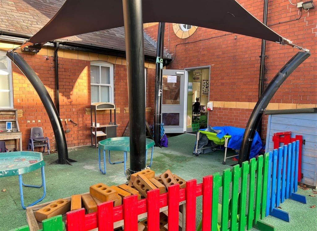 Solicitors lay down the law and pick up tools to help revamp school