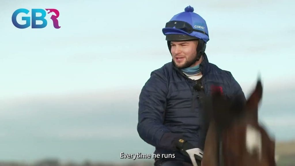 TV star Chris Hughes rides racehorse on beach in Wales