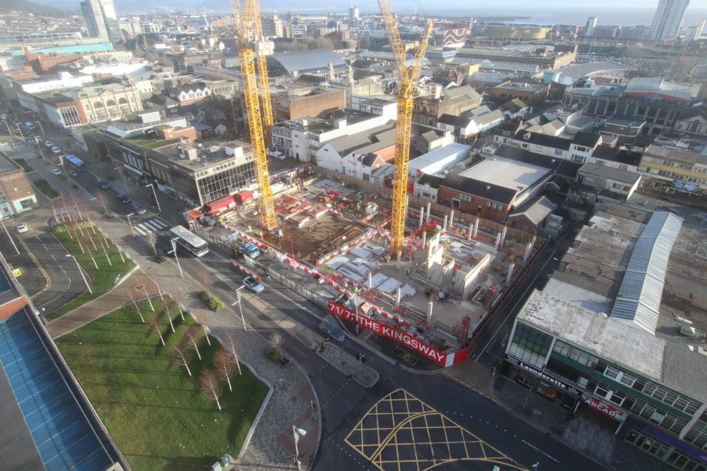 New Swansea office development build reaches street level