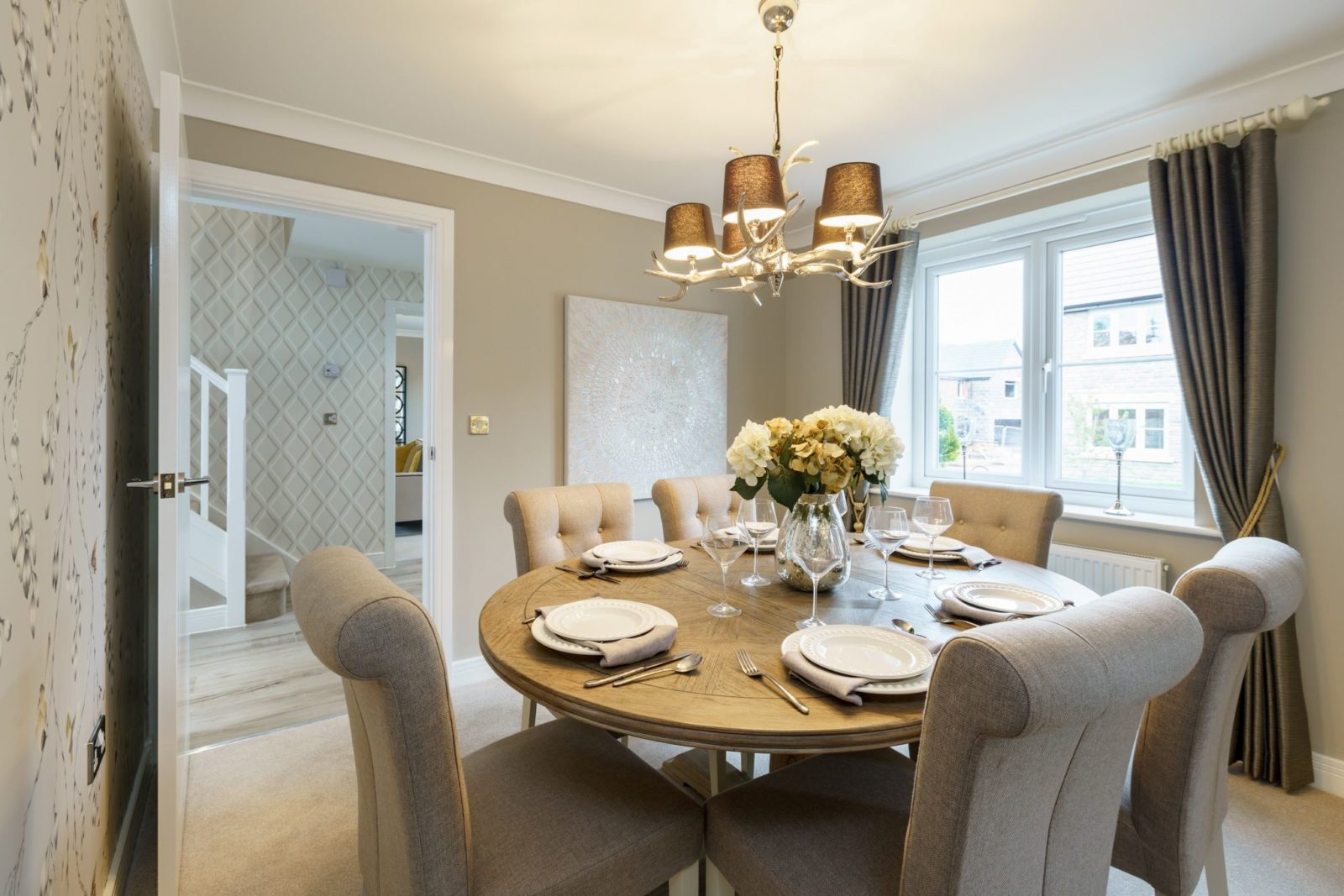 Showhome furniture auction raises nearly £3k for Cancer Research UK