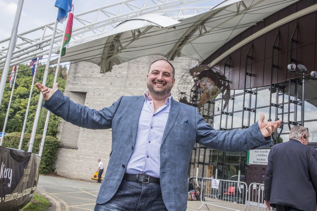Go Compare tenor Wynne Evans joins choir for 90th birthday bash in support of children’s hospice