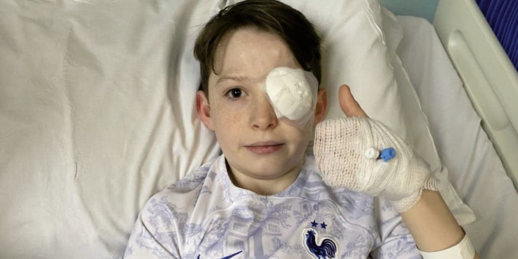 Routine eye test leads to sight-saving surgery for young football enthusiast
