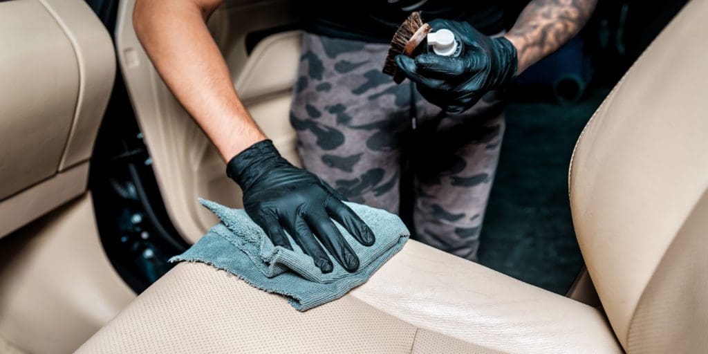 Fabric or Leather Goods: Choosing the Right Upholstery Material and DIY Car Seat Cleaning Tips