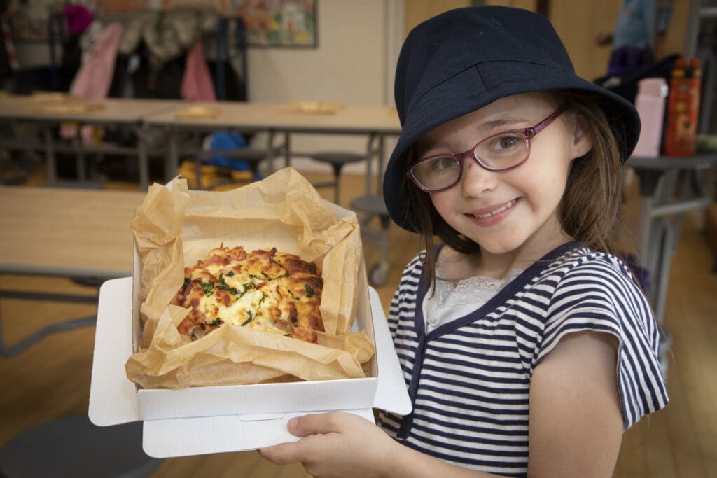 Rhos youngsters get expert guidance on pizza-making from chef Steve