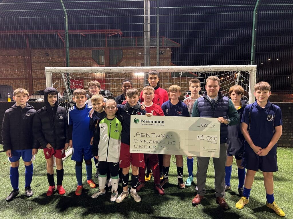 Cardiff-based youth football team score £1,000 donation
