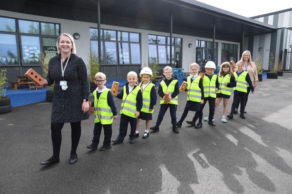 Hi vis jackets help pupils at Glan Llyn Primary School learn about construction