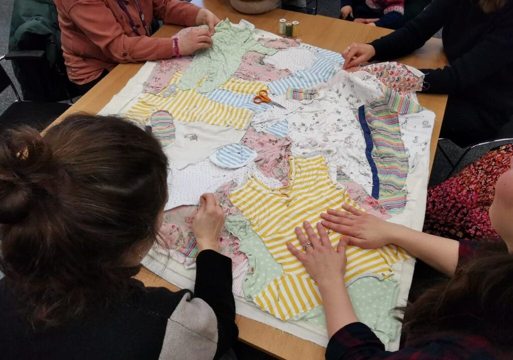 Mothers sew quilt to promote infant feeding discussions