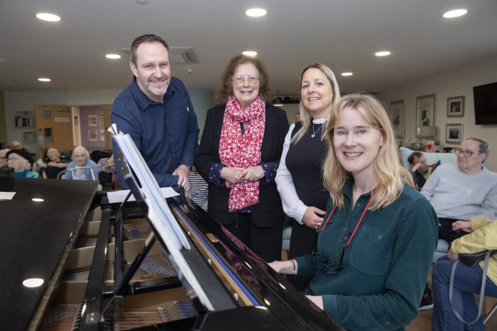 Singalong at Caernarfon care home hits right note for deputy minister
