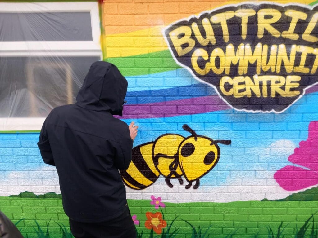 Youth Group Paints Mural at Buttrills Community Centre