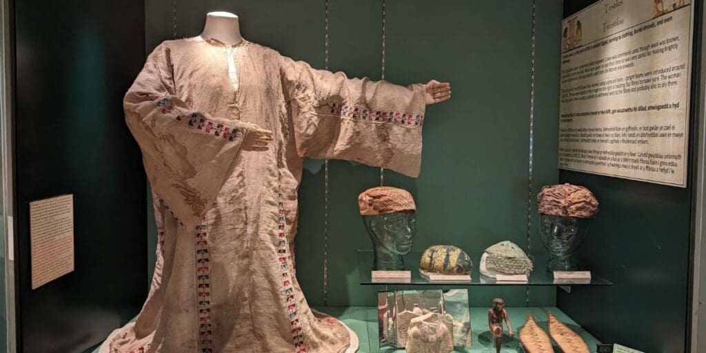 Restored tunic now back on show at Egypt Centre