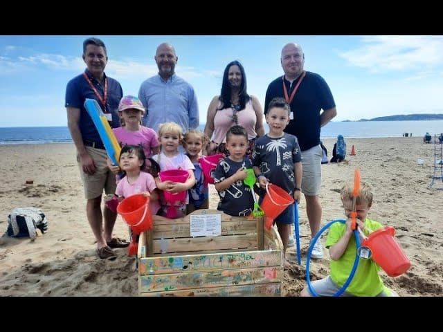 Library loans toys to families visiting the beach