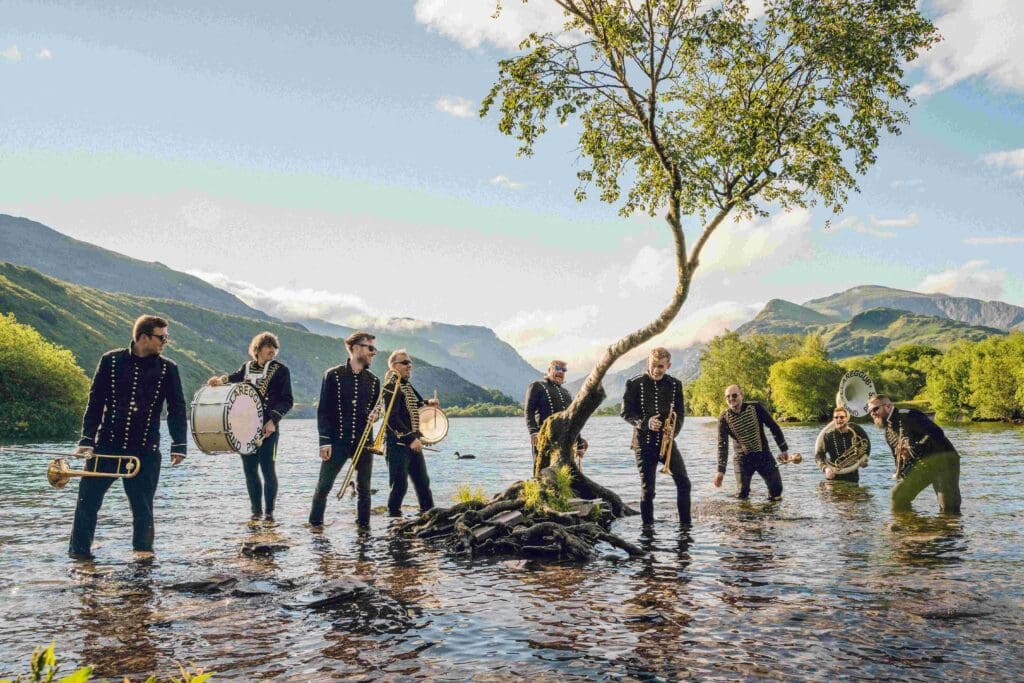 Choir and brass band put new twist on Welsh pop favourites in aid of three good causes