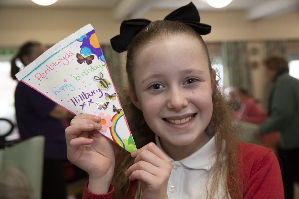 Creative youngsters stage colourful 40th anniversary celebration at care home