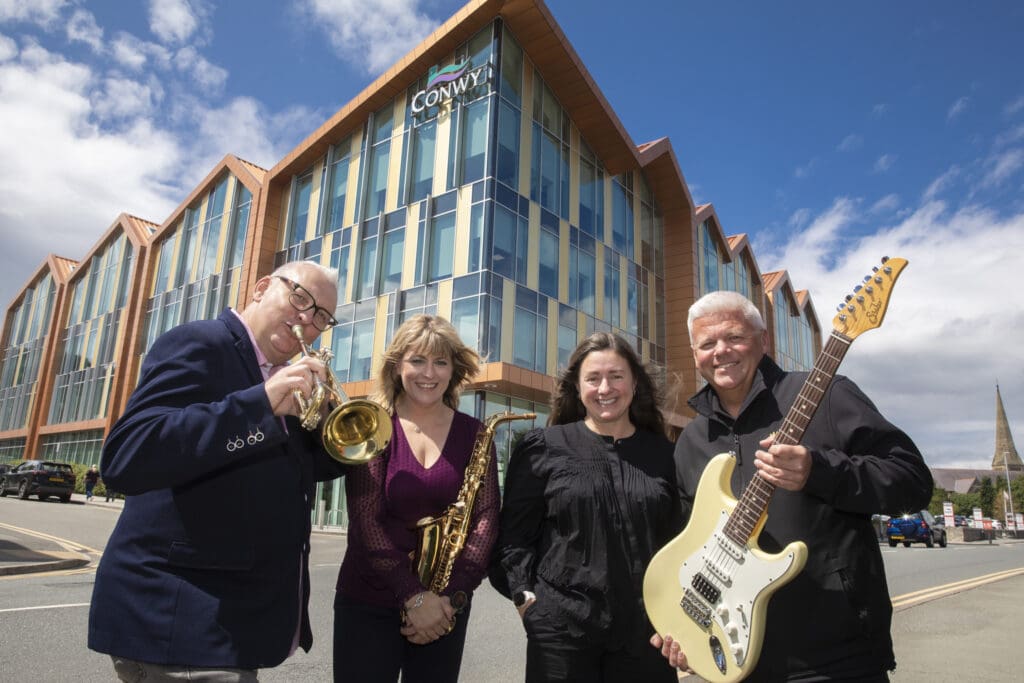 Award-winning music cooperative recruits tutors for “excellent” new service in Conwy