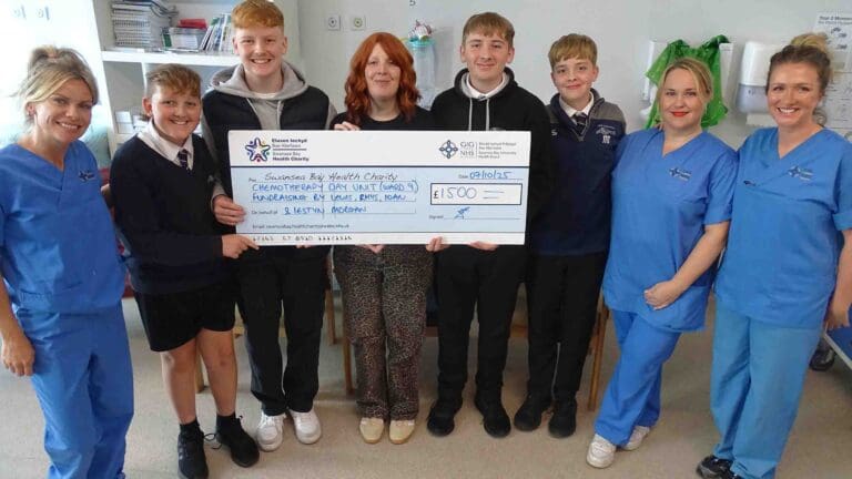 Swansea brothers raise thousands in tribute to hospital staff helping their mum