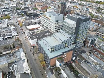 Drone footage shows landmark living building taking shape in Swansea
