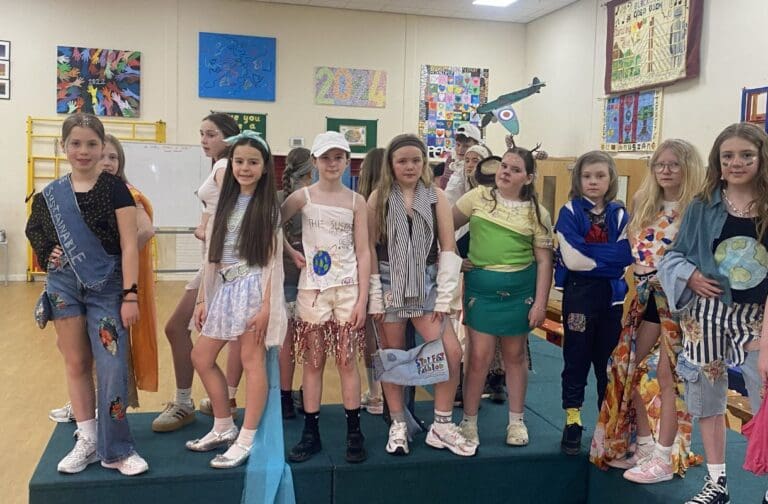 Children transform old curtains and bedsheets into eye-catching eco fashion designs