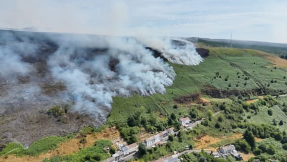 Major incident declared as firefighters battle Rhondda wildfire