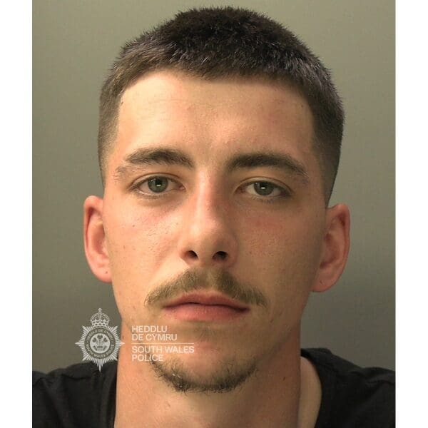 Banned driver jailed after ramming police car twice during pursuit