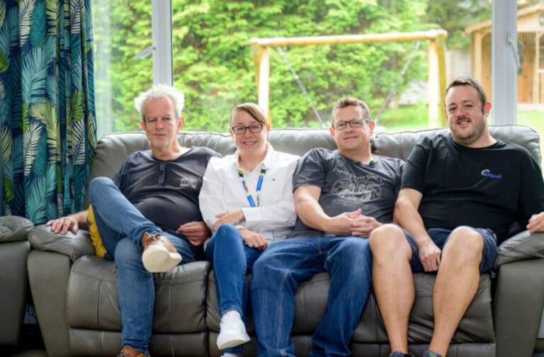 Llandovery care service Clynsaer rated ‘Excellent’ for well-being and leadership Four members of Clynsaer staff sitting on a sofa