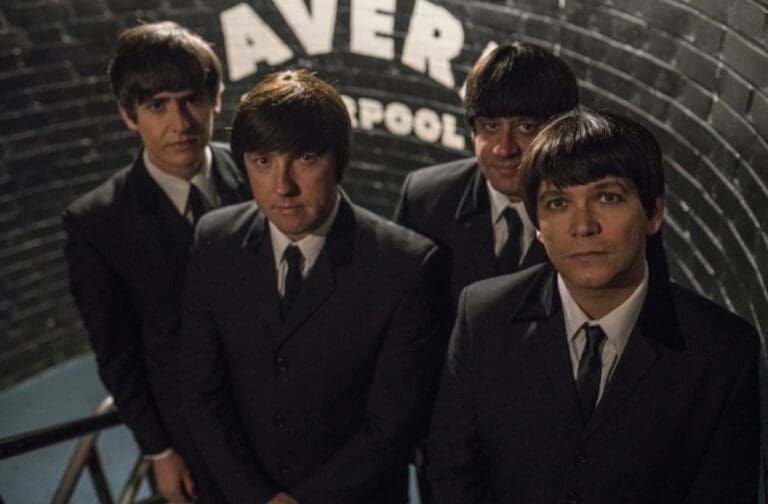 Beatles tribute band brings 60th anniversary celebration to Wrexham The Mersey Beatles in costume as The Beatles