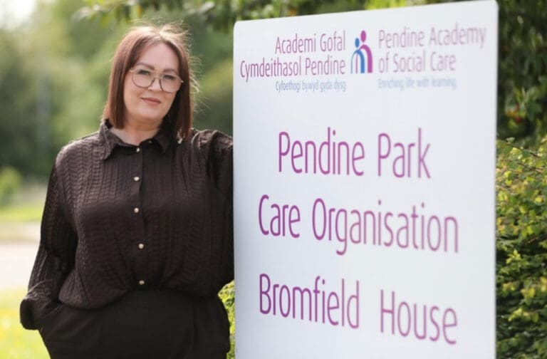 Pendine Academy of Social Care manager Jenna Evans shortlisted at Wales Care Awards Jenna Evans beside a Pendine Park sign
