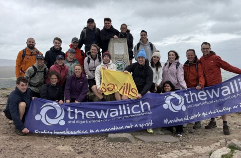Savills Cardiff team conquers Abergavenny Three Peaks for charity Savills Cardiff colleagues on the Abergavenny 3 Peaks Challenge for The Wallich