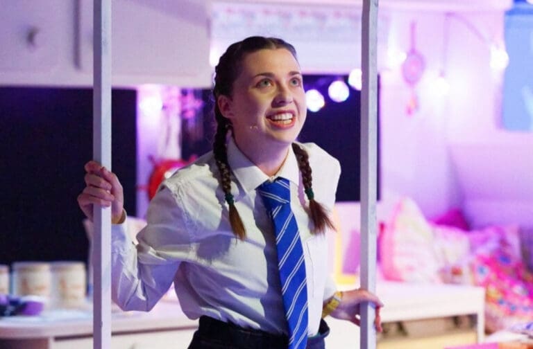 Welsh theatre company wins national STEM award for bilingual musical Erin Dolan as Emmie in Theatr na nÓg's musical Dal y Gwynt / Eye of the Storm